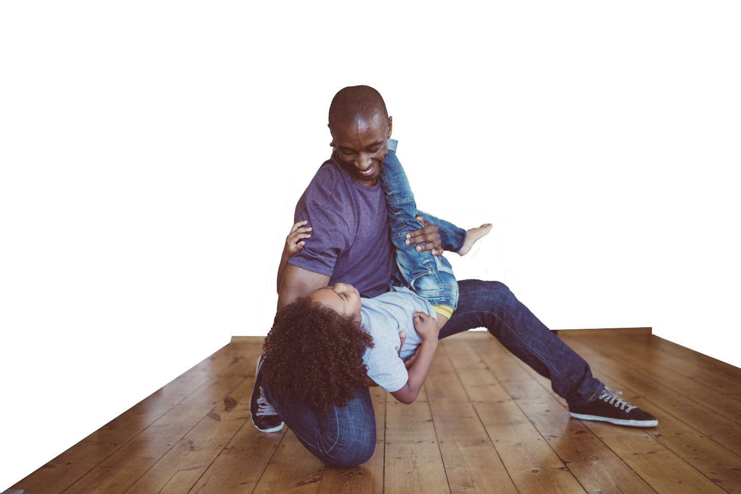 Father and daughter dancing on newly installed hardwood flooring.